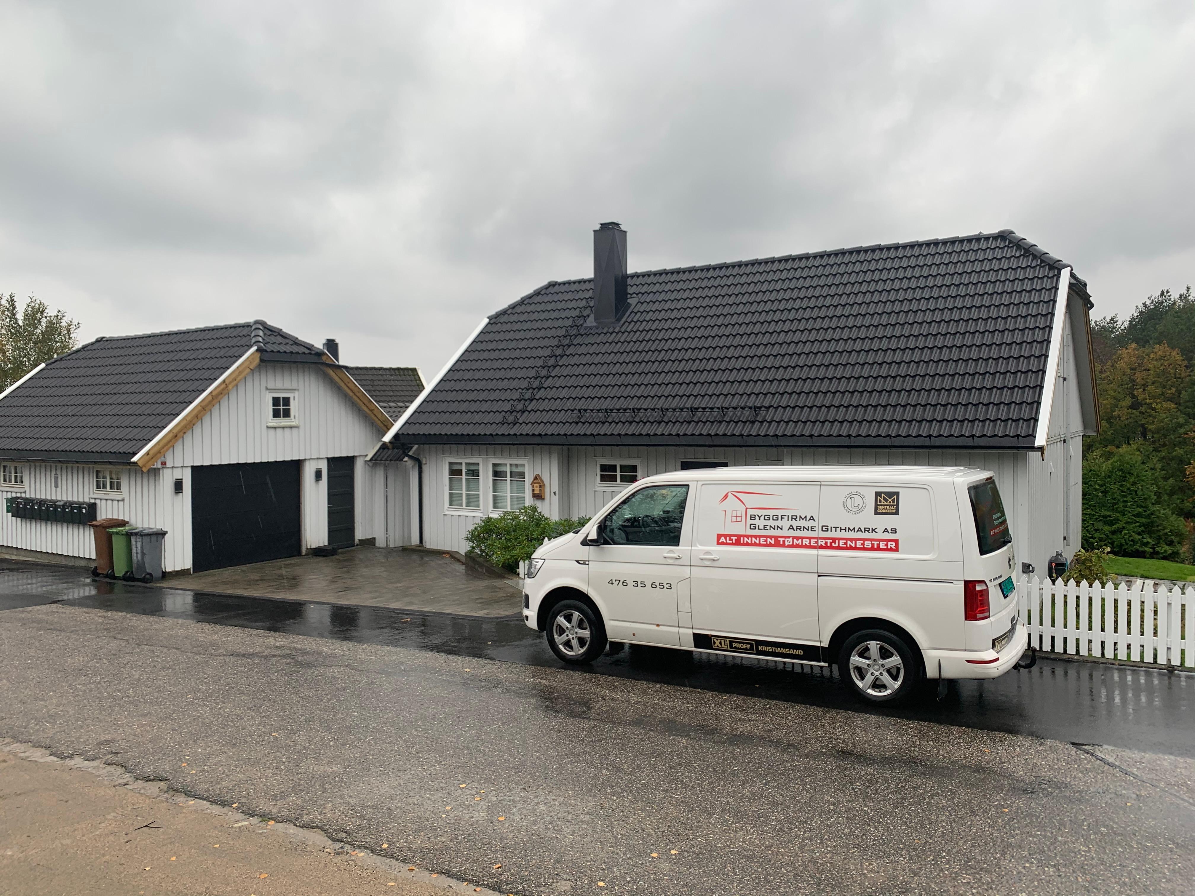 The firm’s white van parked on a street by a house